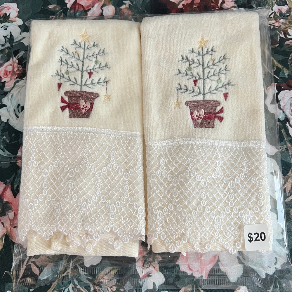 Two embroidered Christmas hand towels